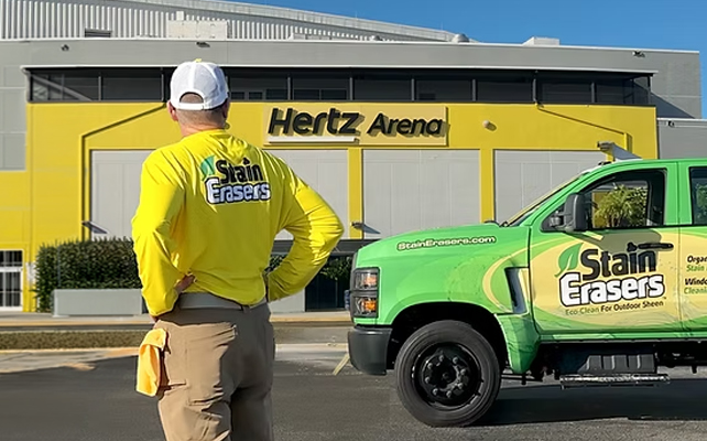 Stain Erasers technician and truck on site at the Hertz Arena