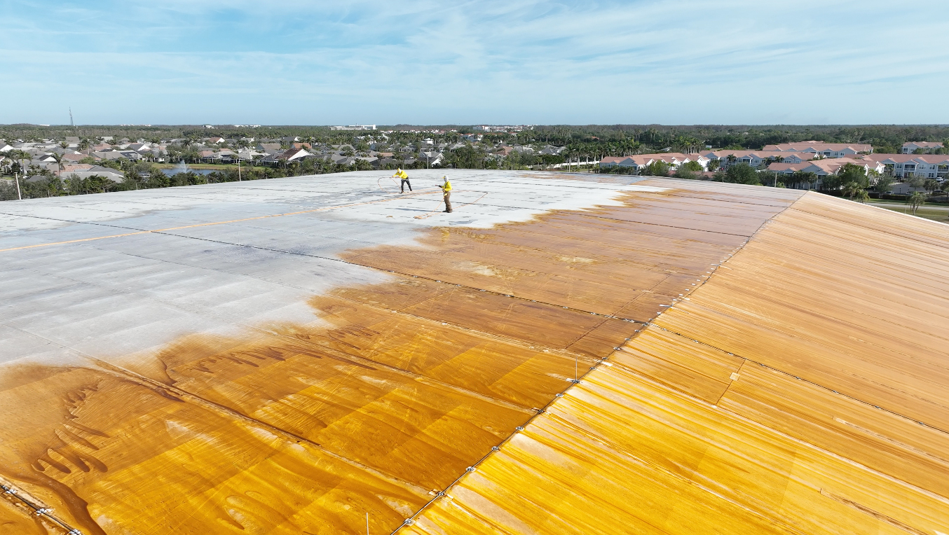 A clean white TPO arena roof maintained by Stain Erasers